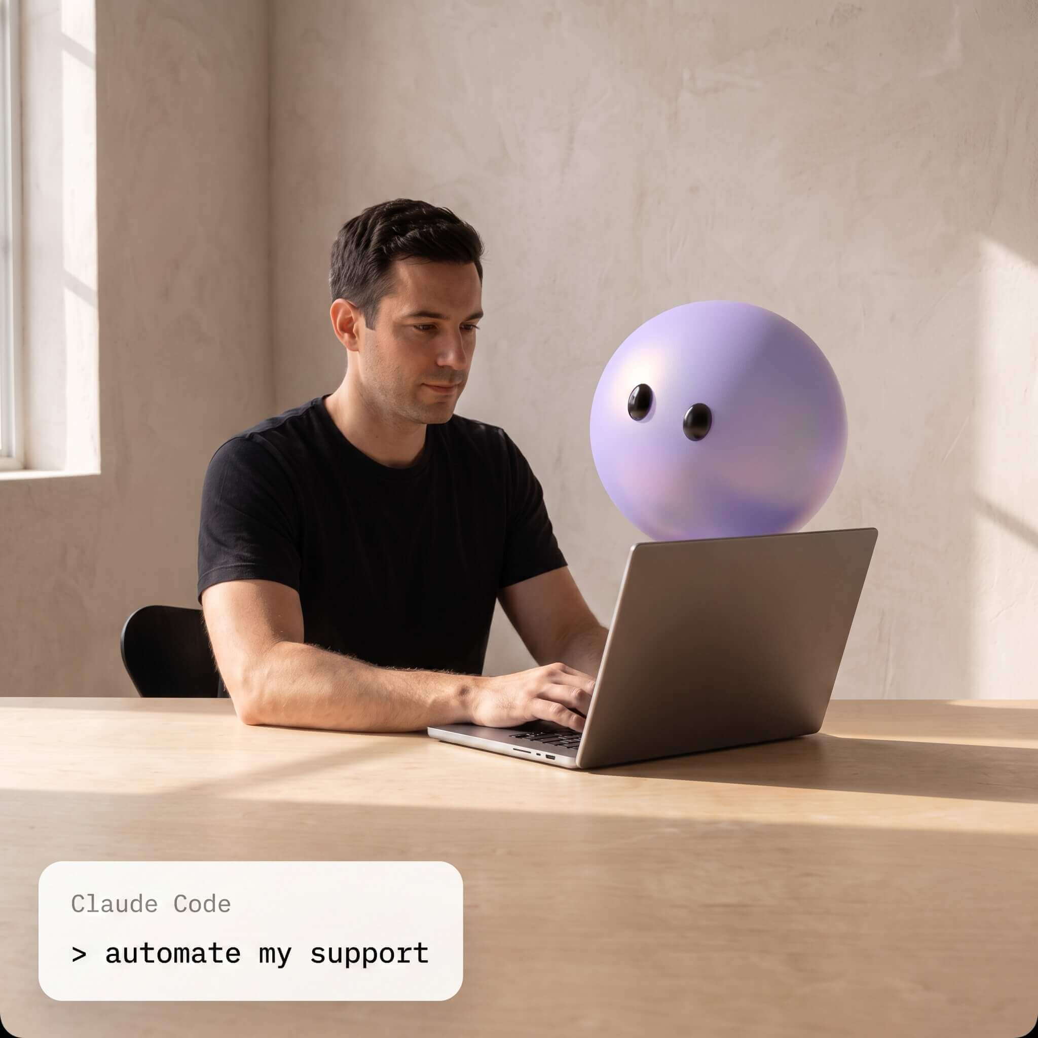A support lead at a laptop with Lyro pictured as a lavender sphere resting above the screen.